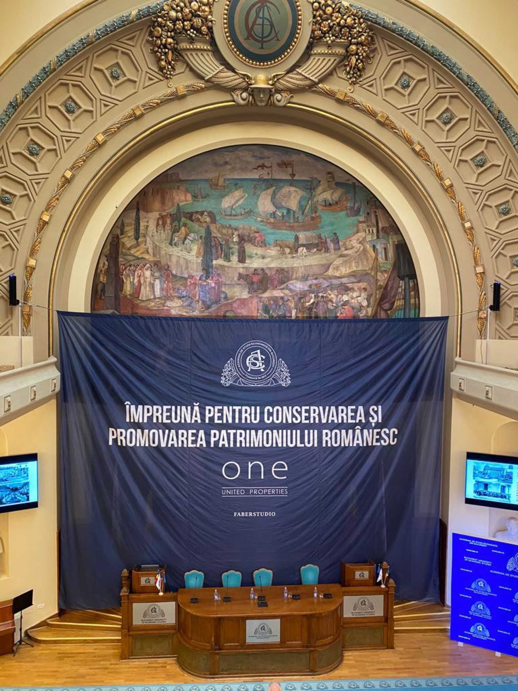 Restaurarea picturii murale din Aula Academiei de Studii Economice a fost finalizată cu sprijinul One United Properties