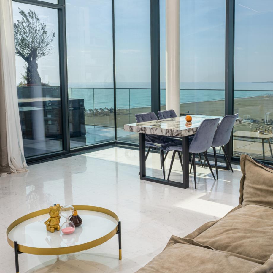 Live in elegance, just a step away from the sea.